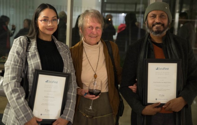 Winners of the Francis Wilson Memorial Prize for Data-Driven Research, Dr Rifqah Roomaney of the University of the Western Cape (left) and UCT’s Prof Vimal Ranchhod of SALDRU are congratulated by the late Emer Prof Francis Wilson’s widow, Lindy Wilson (middle). Photo: Prof Martin Wittenberg.
